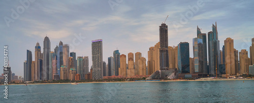 high-rise buildings stand on the horizon, modern Dubai © Igor