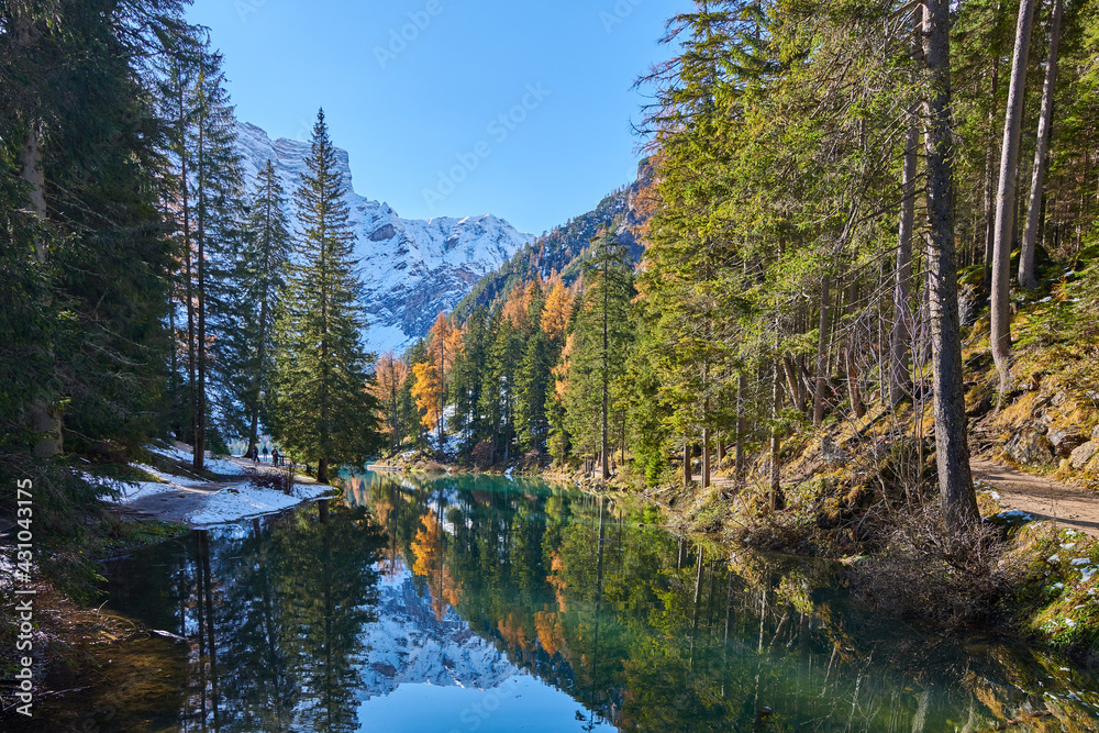 The beautiful Braies lake in late autumn with a little snow, Pearl of the Dolomite lakes is an UNESCO heritage and is located in the Braies Alto Adige,Italy