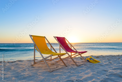 Colorful beach lounge chairs at the beach
