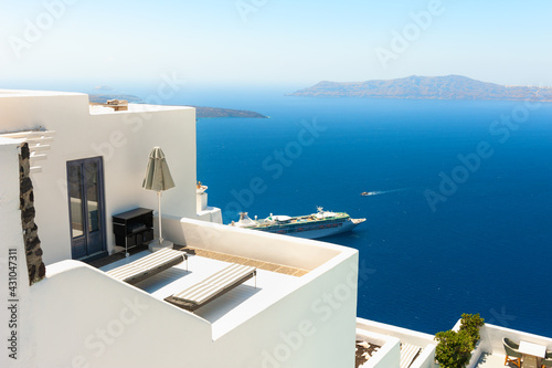 White architecture on Santorini island, Greece. Beautiful terrace with sea view. Famous travel destination