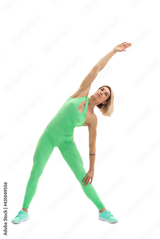 full body portrait of young sporty woman stretching before exerc full body portrait of young sporty woman stretching before exerc