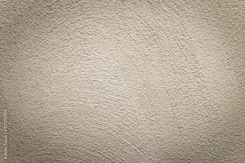 Concrete background. Plaster on the wall. Embossed textured surface.