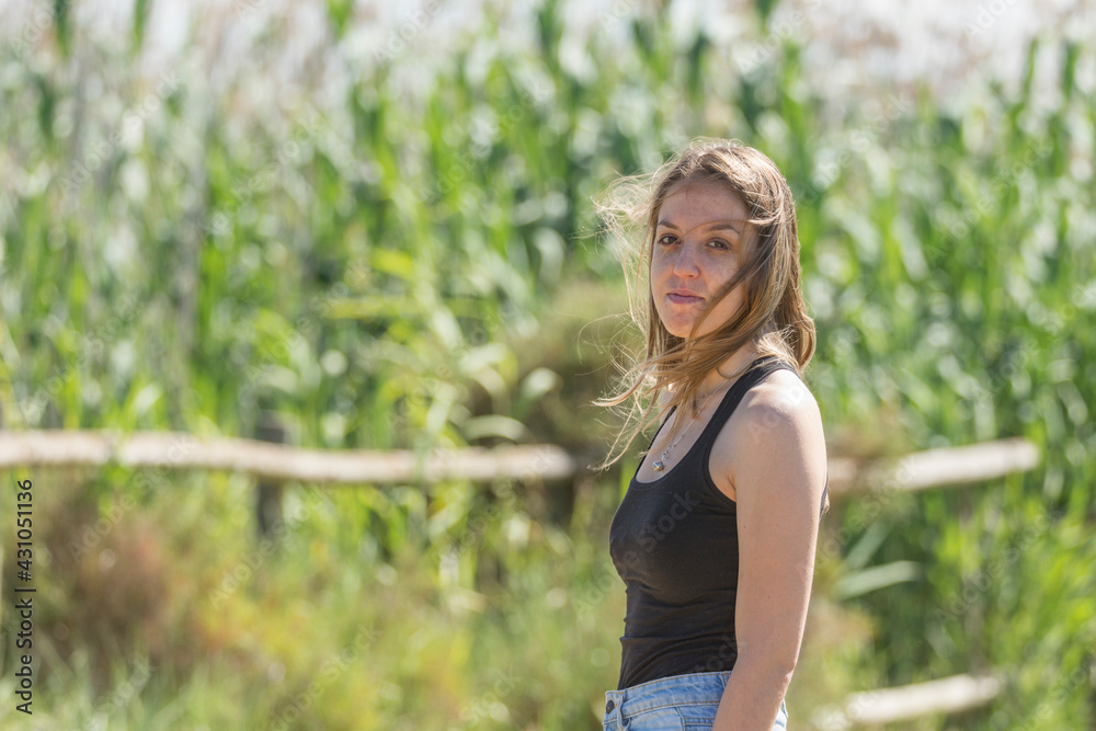 Portrait of a young long-haired girl in nature Portrait of a young long-haired girl in nature