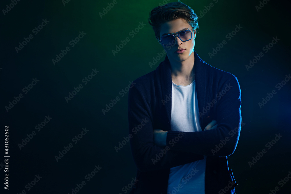 Cool stylish man in black jacket and sunglasses. High Fashion ma Cool stylish man in black jacket and sunglasses. High Fashion ma