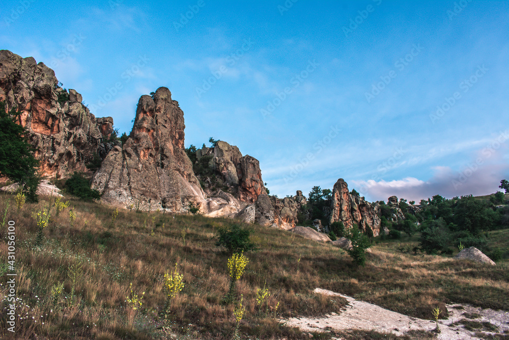 The wonderful geography of Phrygia. City of the Phrygians. Rocks, steppe and mountains. View of the Phrygian valley. Rock houses in the ancient city.