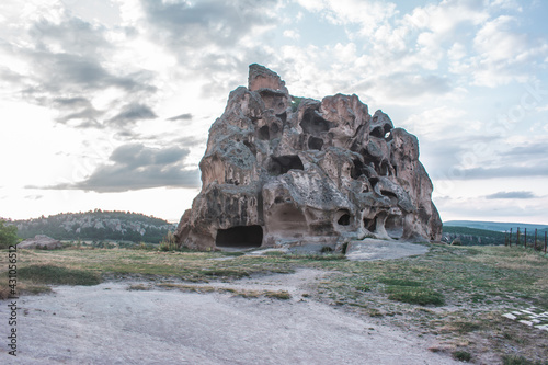 Ancient rock tombs. Inscriptions written on rocks centuries ago. Phrygian valley. The ancient city of Phrygia. Ancient tombs in the mountains. photo