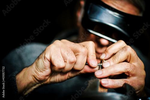Man work - handcrafting jewellery.
