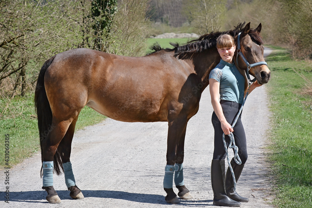 Obraz premium Mädchen mit Pony