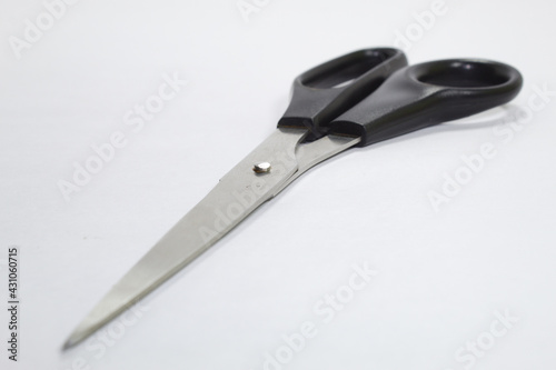 Scissors for cutting paper with white background