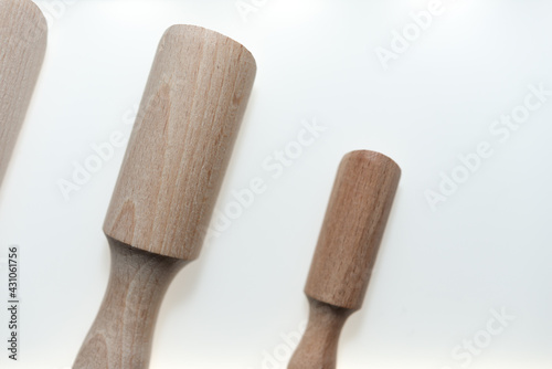 plain beech wood scoops on a white background with slight shadow