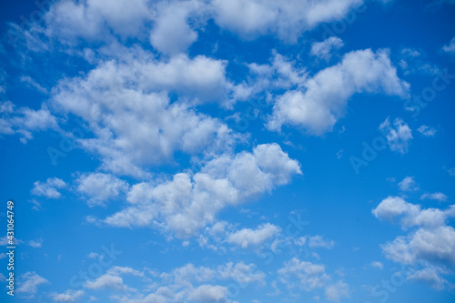Blue sky and white cotton clouds background. Alicante, Spain.