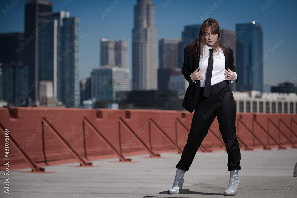 Fototapeta premium Young American in Black Suit and Black Tie