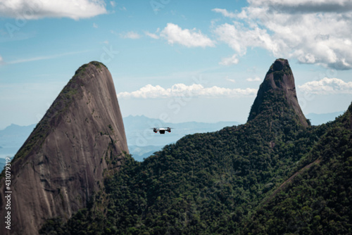 drone flying over mountains photo