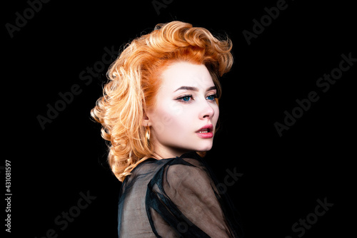 Woman with redhead in black studio, isolated headshot portrait.