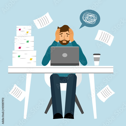 Man feel stress in office. Headache while working with computer and documents. Work load deadline. Stress at work.