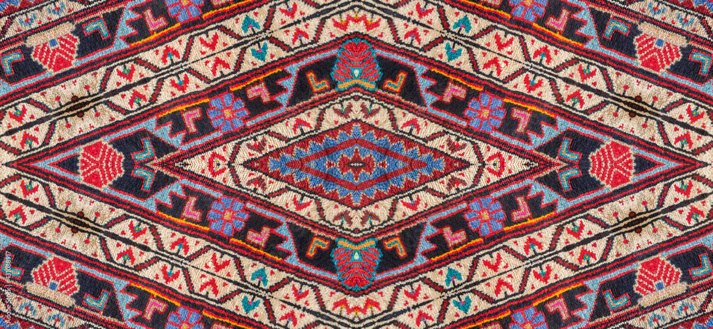 Kaleidoscopic Close-up pattern of a Persian handmade carpet border