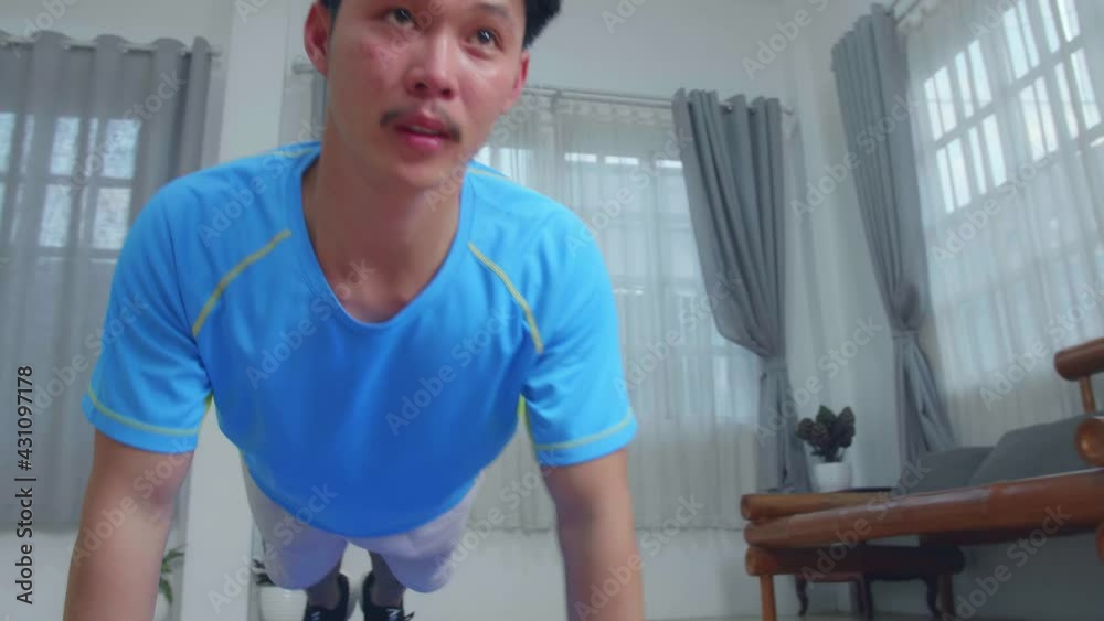 Young Asian Man Doing Push Up Exercises At Home
Young Asian Man Doing Push Up Exercises At Home