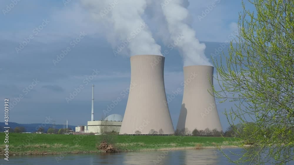Nuclear power plant against sky at sunset Nuclear power plant against sky at sunset