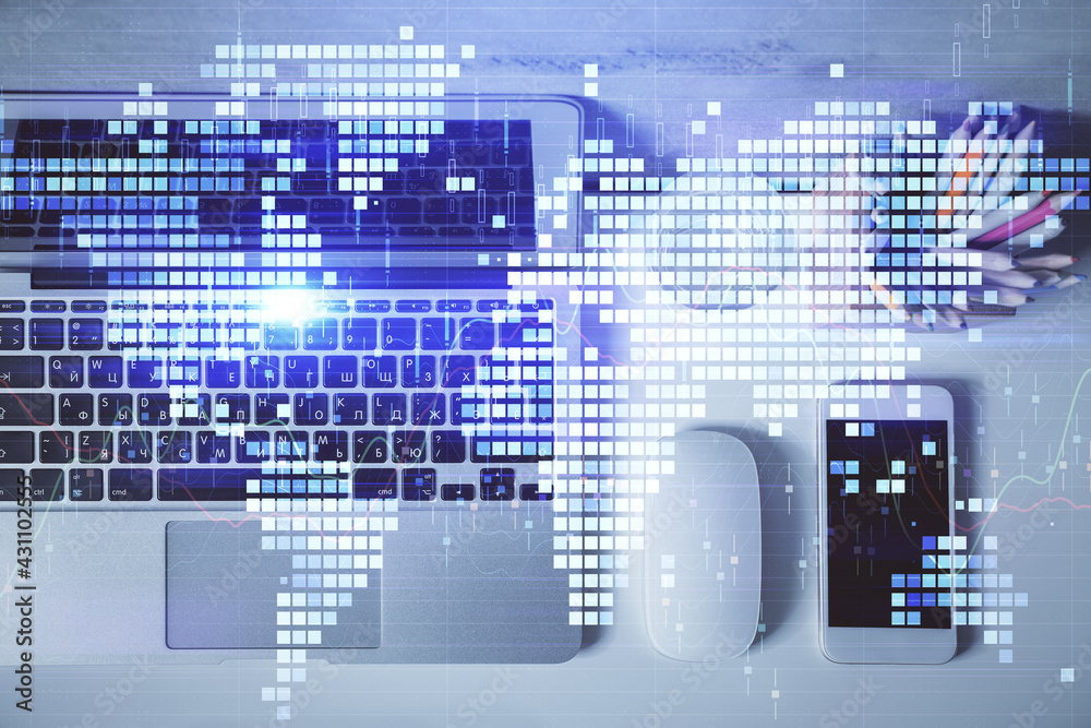 Business theme hologram drawings over computer on the desktop background. Top view. Multi exposure. Concept of international connections. Business theme hologram drawings over computer on the desktop background. Top view. Multi exposure. Concept of international connections.
