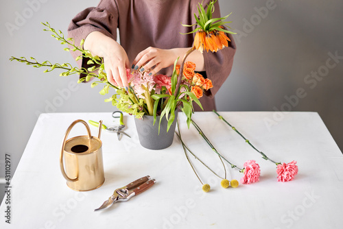 Step by step installation of flowers in a vase. Flowers bunch, set for home. Fresh cut flowers for decoration home. European floral shop. Delivery fresh cut flower. photo