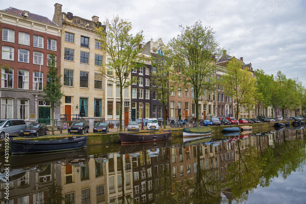 Fototapeta premium Cloudy September morning on the city canal, Amsterdam