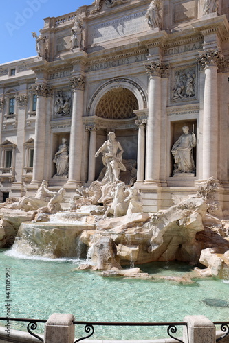 ancient monument called Trevi fountain in the center of Rome with the statue of Neptune without tourists due to the coronavirus in Italy