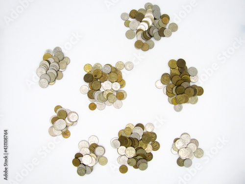 A lot of small piles of coins in the Russian currency ruble.