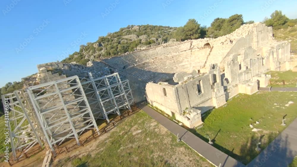 Cinematic Racing Drone Shot of Pttra Ruins of the ancient Lycian city Patara. Amphi-theatre and the assembly hall of Lycia public. Patara was at the Lycia Lycian League's capital. Aerial view shooting Cinematic Racing Drone Shot of Pttra Ruins of the ancient Lycian city Patara. Amphi-theatre and the assembly hall of Lycia public. Patara was at the Lycia Lycian League's capital. Aerial view shooting