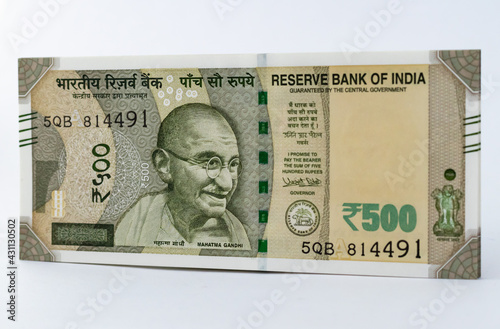 A new 500 INR currency note against white background - economy concept