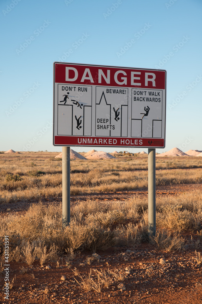Opal Mining fields in Greater Coober Pedy with danger warning sign