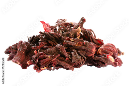 Pile of dried karkade flowers isolated on white background. Red aromatic hibiscus tea. Dry tea leaves hibiscus isolated on white background. Dried red rosella, hibiscus, karkade, rosella, sorrel.