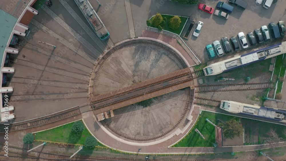 Railway hub. Aerial view of roundhouse and railway turntable at the locomotive depot, Kyiv, Ukraine. fan-shaped train depot Railway Roundhouse. Locomotive wait. 4k footage 