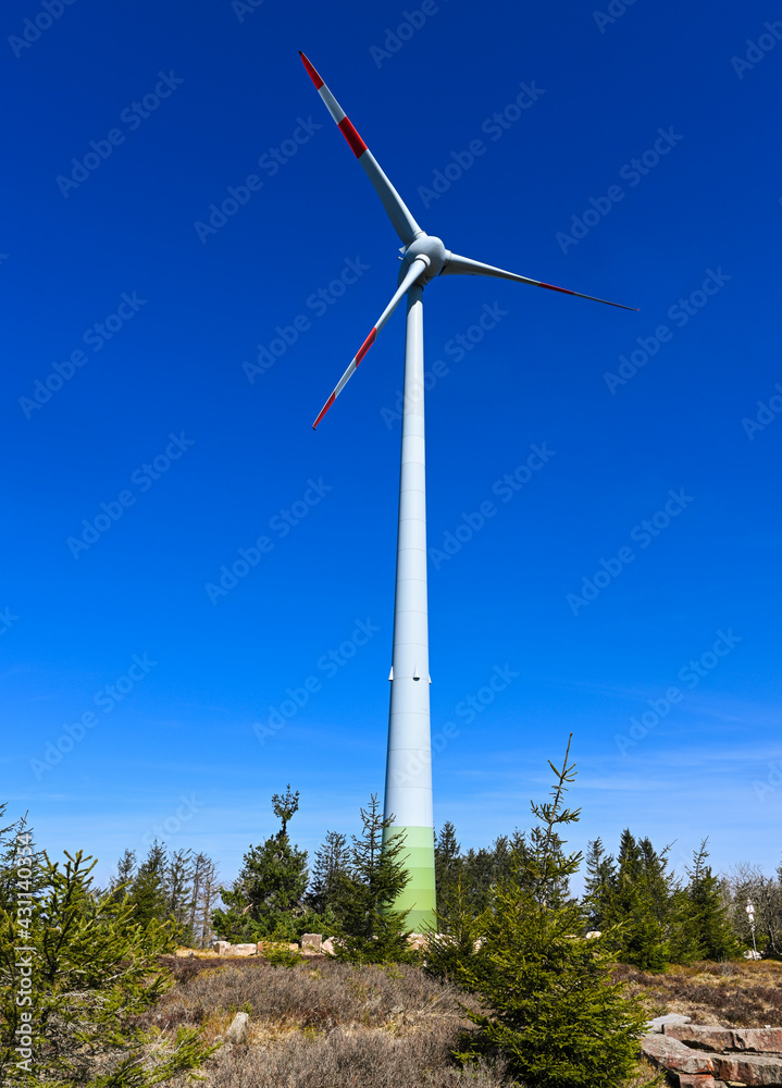 Wind turbine on the Hornisgrinde, Black Forest, in the middle the small Bismark tower. Baden Wuerttemberg, Germany, Europe Wind turbine on the Hornisgrinde, Black Forest, in the middle the small Bismark tower. Baden Wuerttemberg, Germany, Europe