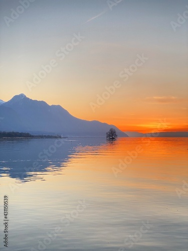Spring sunset over the eastern shore of Lake Geneva (lac de Genève, lac Léman or Genfersee), Villeneuve - Canton of Vaud, Switzerland (Suisse)