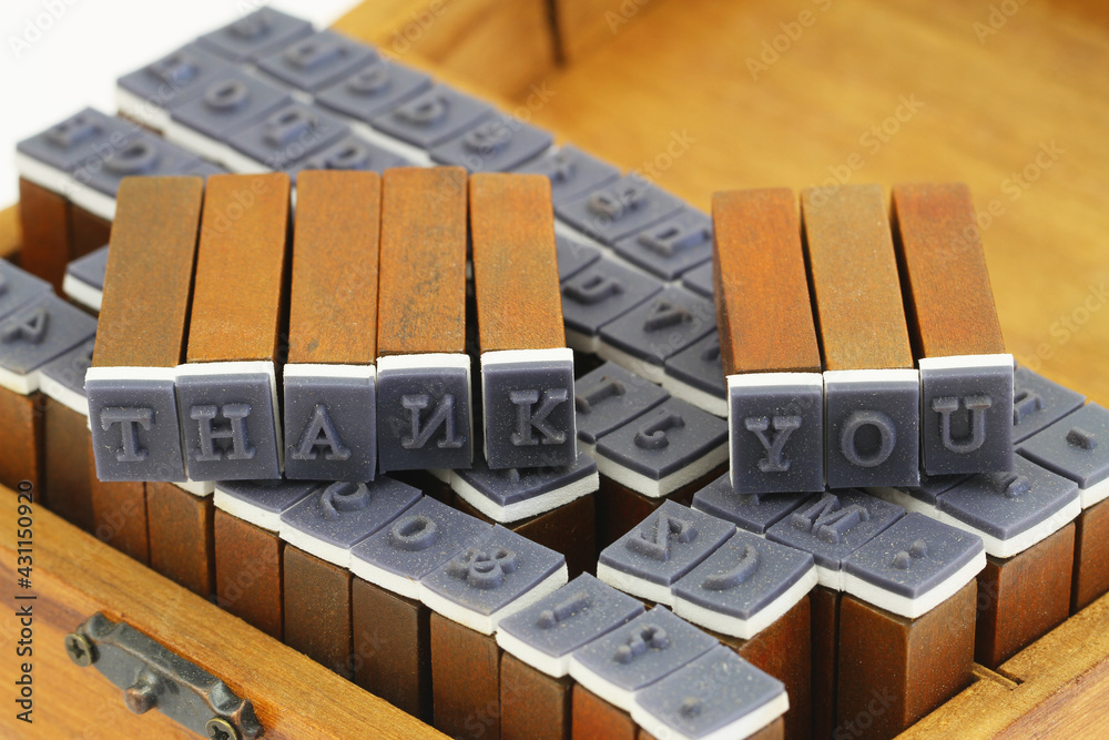 Words thank you made of vintage wooden stamps