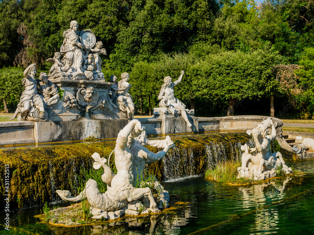 Impressive view of the fountain of Ceres, magnificent sculptural composition made using Carrara marble and travertine, Royal Palace of Caserta, Italy
