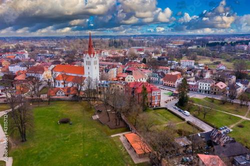 Aerial view of beautiful city of Cesis in Latvia. View on the city center, main city church and ruins of ancient Livonian castle in old town of Cesis, Latvia photo