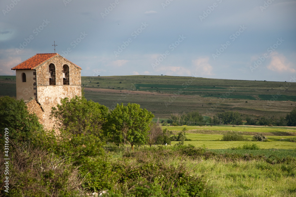 Beautiful landscape of spanish  countryside with church at sunset. Soria, Spain