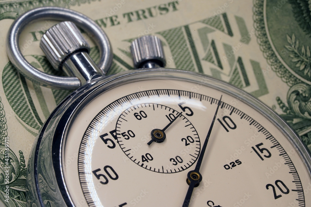 Stopwatch close-up. Chronograph round isolated on background. Macro. Clock. Scale of the measuring device. Timer Stopwatch close-up. Chronograph round isolated on background. Macro. Clock. Scale of the measuring device. Timer