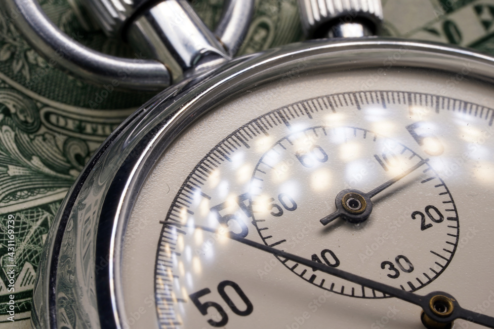 Stopwatch close-up. Chronograph round isolated on background. Macro. Clock. Scale of the measuring device. Timer Stopwatch close-up. Chronograph round isolated on background. Macro. Clock. Scale of the measuring device. Timer