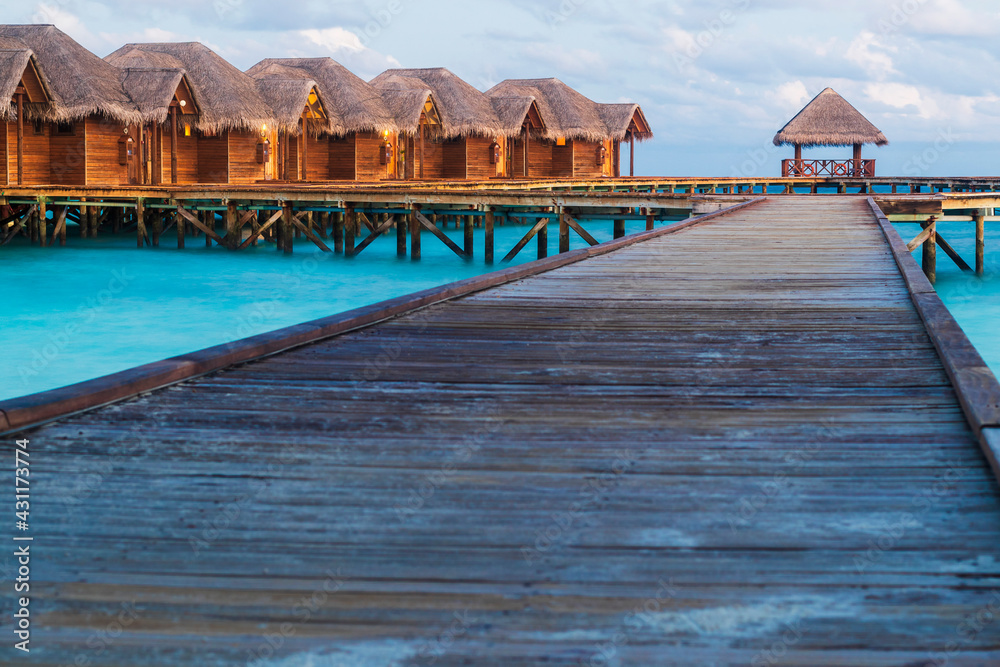Shot of a over water bungalows on tropical island. Holiday