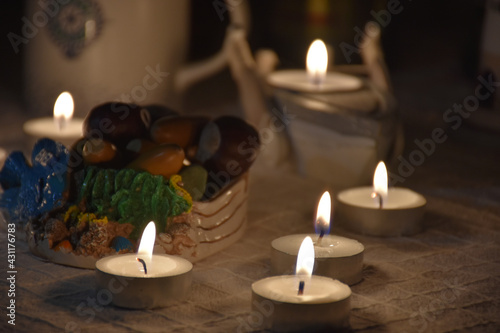 romantic tealights  candles  in a dim floor