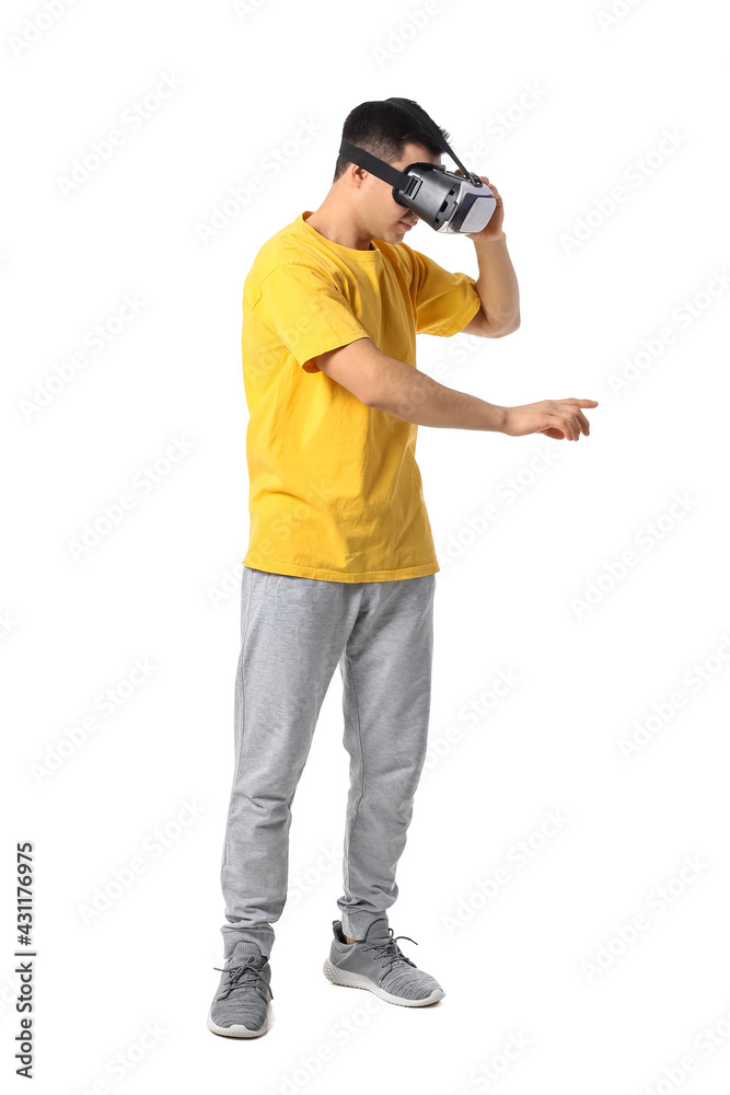Young man with virtual reality glasses on white background Young man with virtual reality glasses on white background