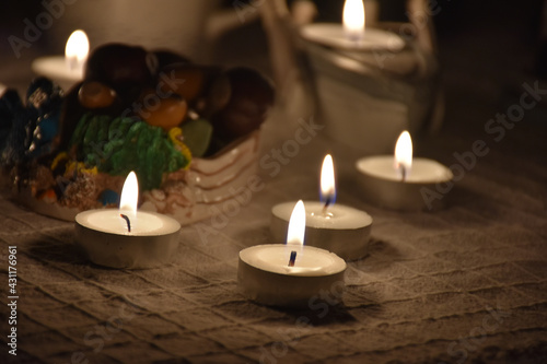 romantic tealights, candles in a dim floor