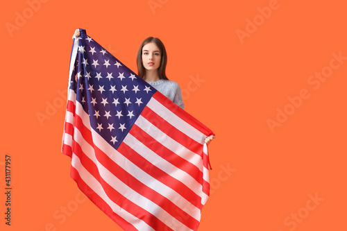 Young woman with USA flag o...