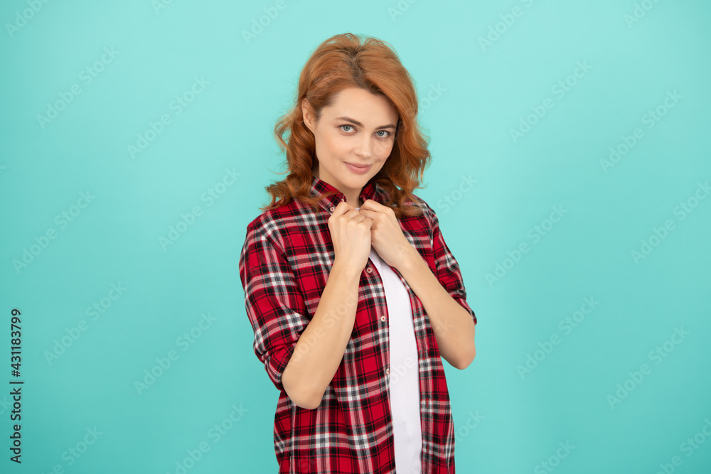 red haired woman. happy redhead woman in checkered shirt. express positive emotions. red haired woman. happy redhead woman in checkered shirt. express positive emotions.