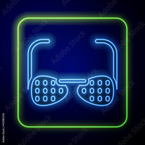 Glowing neon Glasses for the blind and visually impaired icon isolated on blue background. Vector