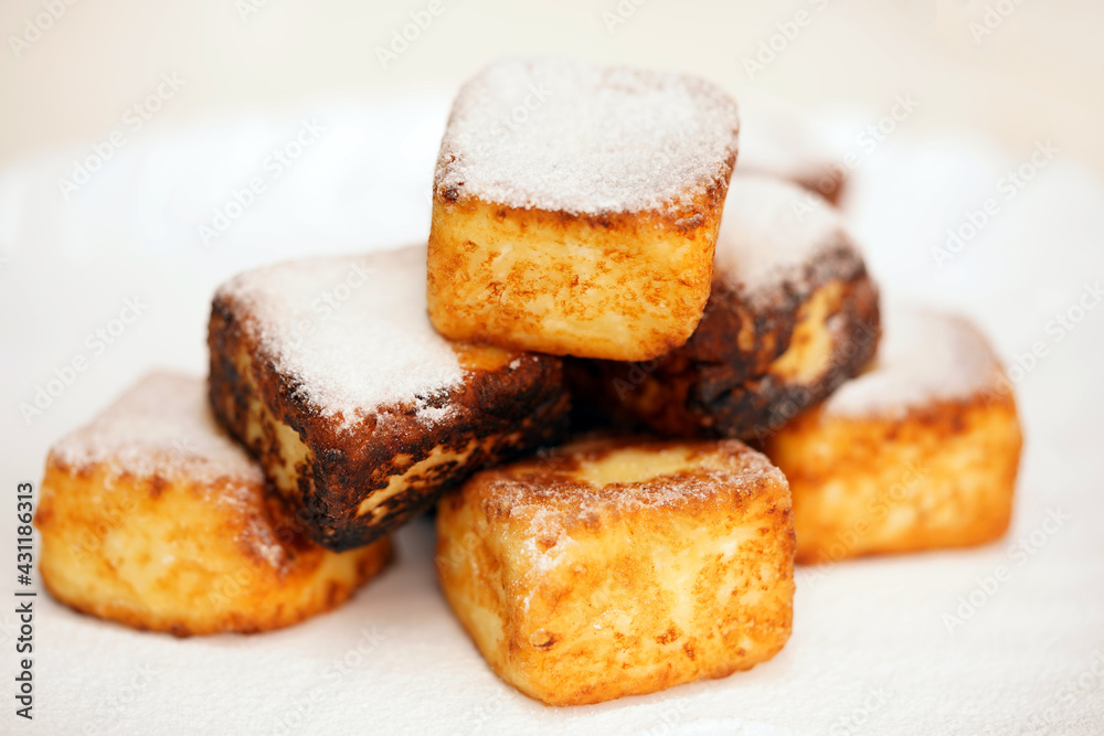 Bakery products. Cheesecakes in the shape of a square. Cottage cheese products.  Hot dish.                                                                                        