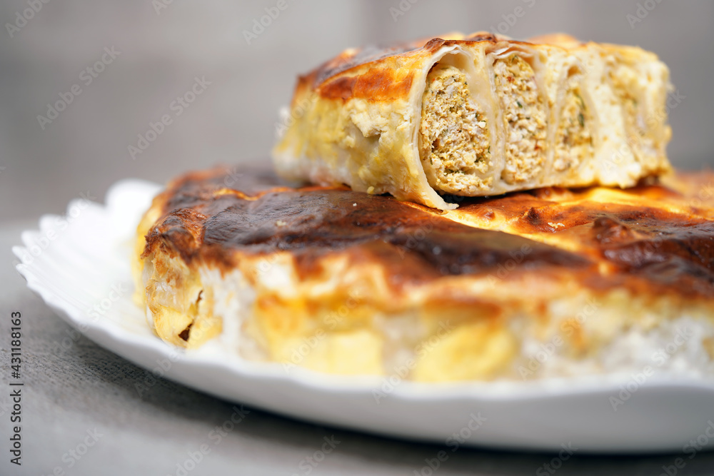 Round ruddy meat pie. Homemade baking. Healthy food. Bakery products. Dough product. Loaf with minced meat. Puff cake, hot dish, dough product
Round ruddy meat pie. Homemade baking. Healthy food. Bakery products. Dough product. Loaf with minced meat. Puff cake, hot dish, dough product