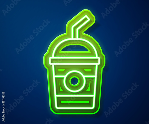 Glowing neon line Milkshake icon isolated on blue background. Plastic cup with lid and straw. Vector
